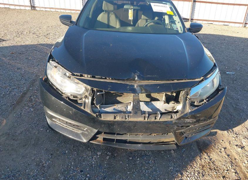 Photo 6 of 2018 Honda Civic LX (VIN 19XFC2F54JE001516)