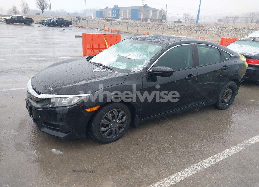 Photo 2 of 2018 Honda Civic LX (VIN 19XFC2F54JE011642)