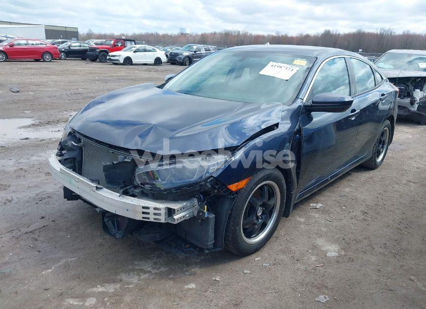 Photo 2 of 2018 Honda Civic LX (VIN 19XFC2F54JE012886)