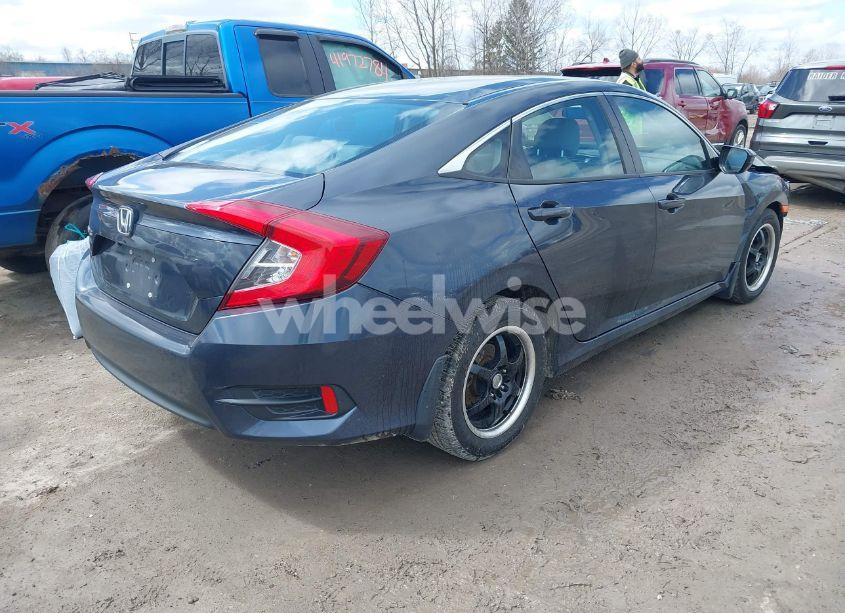 Photo 4 of 2018 Honda Civic LX (VIN 19XFC2F54JE012886)