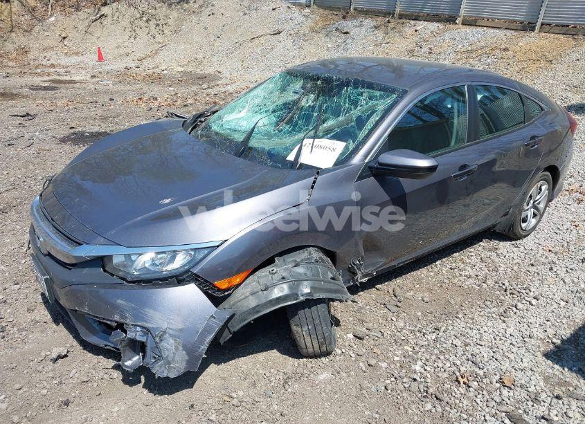 Photo 2 of 2018 Honda Civic LX (VIN 19XFC2F54JE016081)