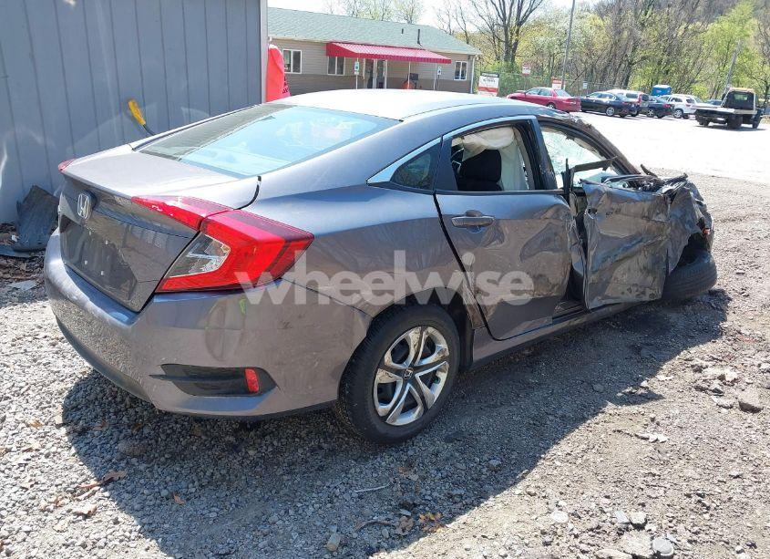 Photo 4 of 2018 Honda Civic LX (VIN 19XFC2F54JE016081)