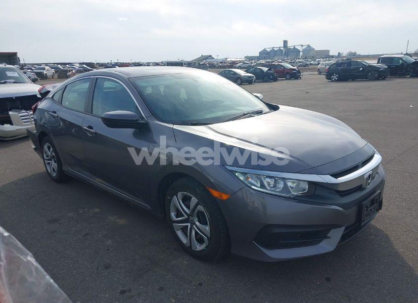 2018 Honda Civic LX (VIN 19XFC2F54JE017344) main photo