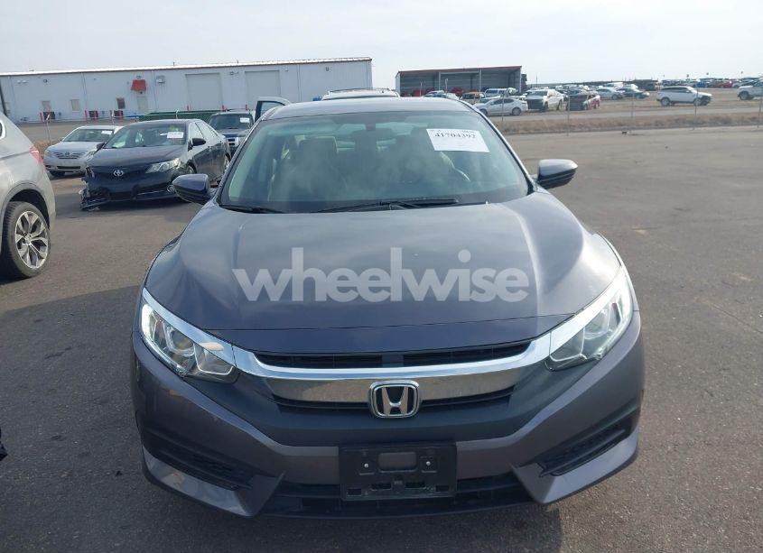 Photo 12 of 2018 Honda Civic LX (VIN 19XFC2F54JE017344)