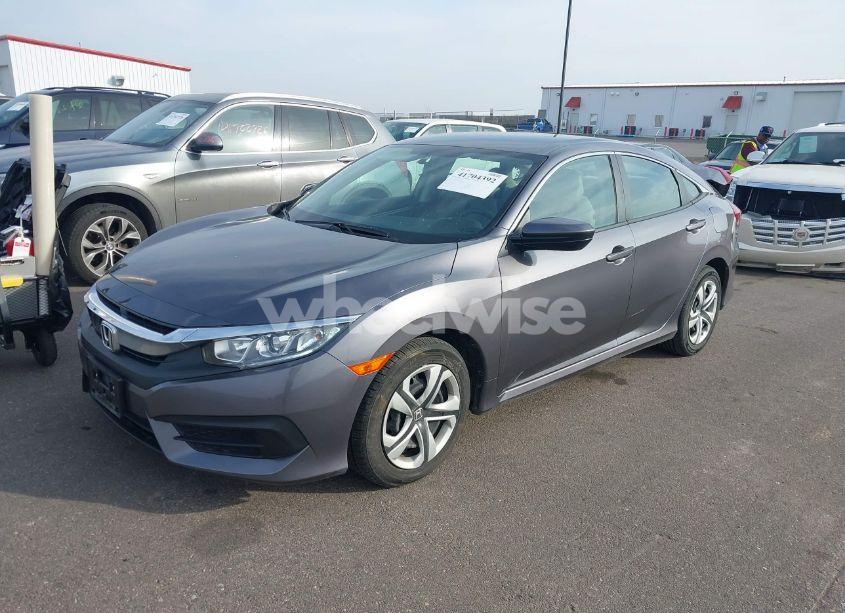 Photo 2 of 2018 Honda Civic LX (VIN 19XFC2F54JE017344)