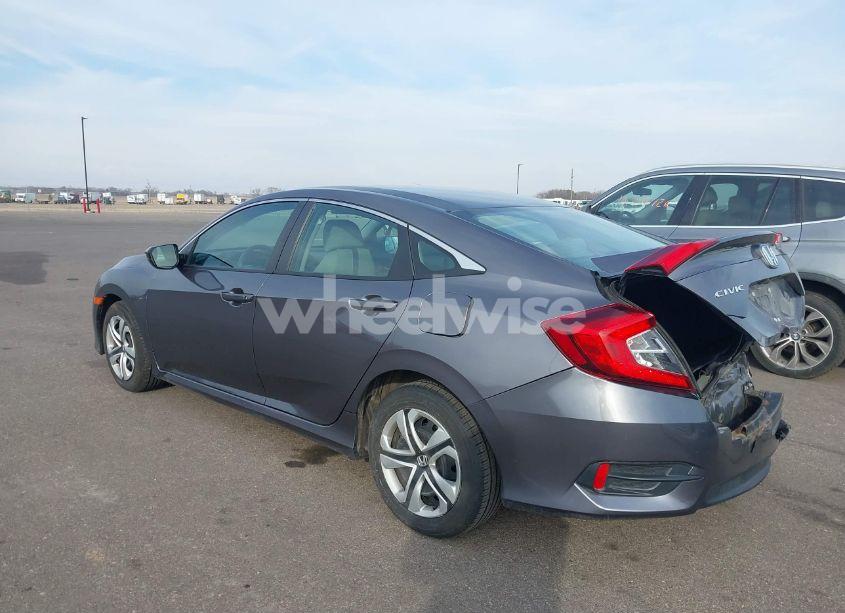 Photo 3 of 2018 Honda Civic LX (VIN 19XFC2F54JE017344)