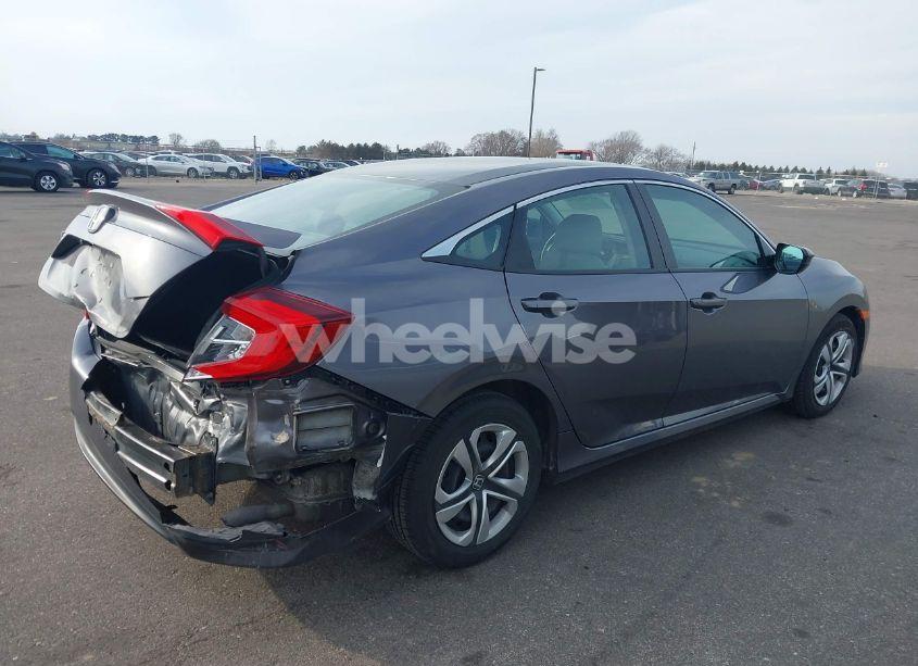 Photo 4 of 2018 Honda Civic LX (VIN 19XFC2F54JE017344)