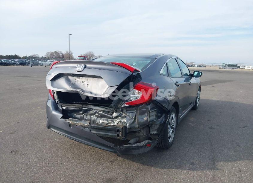 Photo 6 of 2018 Honda Civic LX (VIN 19XFC2F54JE017344)