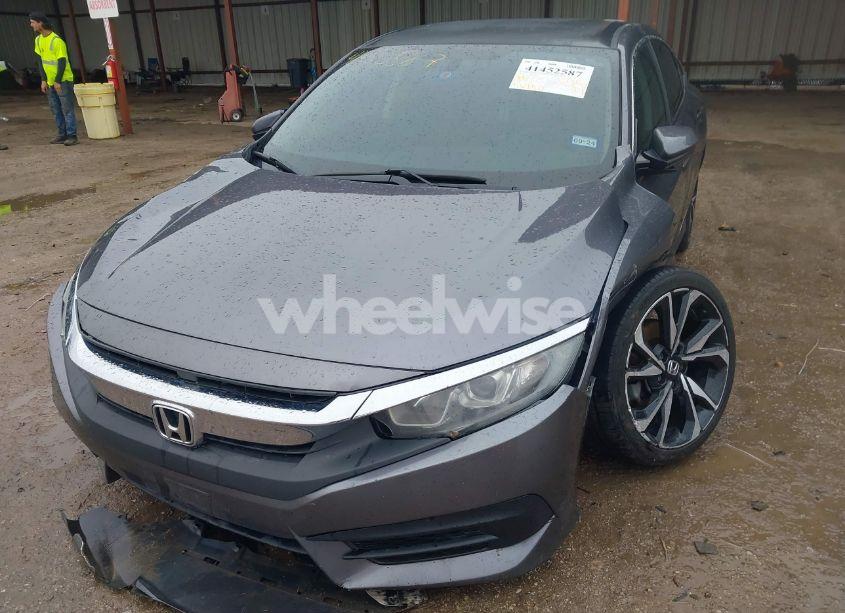Photo 2 of 2018 Honda Civic LX (VIN 19XFC2F54JE023371)