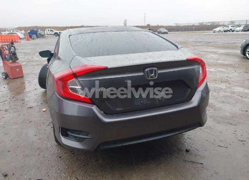 Photo 3 of 2018 Honda Civic LX (VIN 19XFC2F54JE023371)