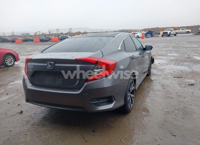 Photo 4 of 2018 Honda Civic LX (VIN 19XFC2F54JE023371)