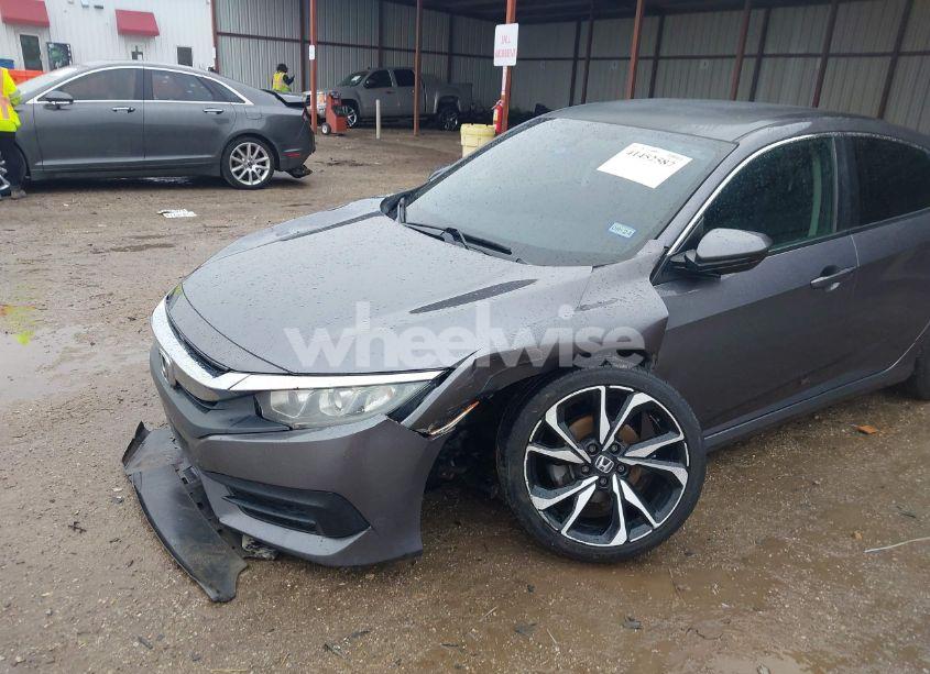 Photo 6 of 2018 Honda Civic LX (VIN 19XFC2F54JE023371)