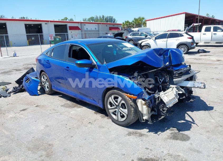 2018 Honda Civic LX (VIN 19XFC2F54JE027744) main photo