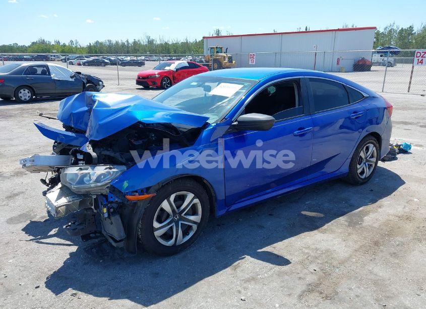 Photo 2 of 2018 Honda Civic LX (VIN 19XFC2F54JE027744)