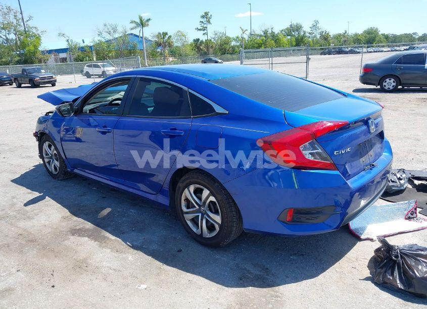 Photo 3 of 2018 Honda Civic LX (VIN 19XFC2F54JE027744)