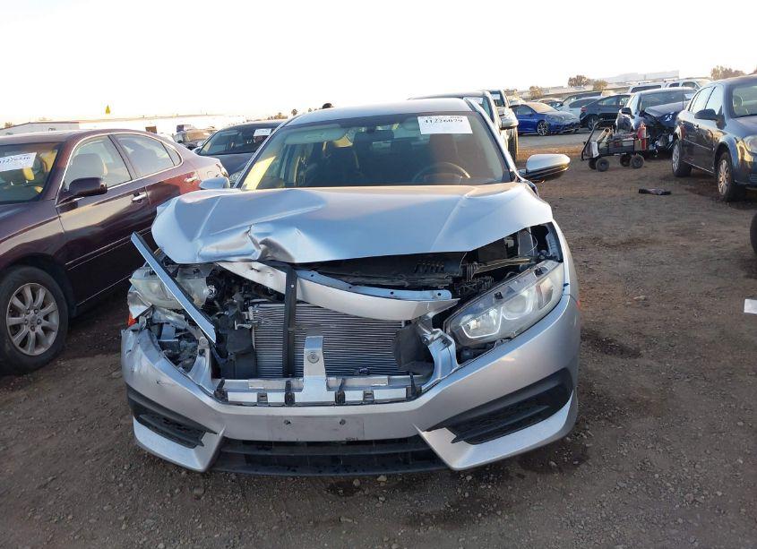 Photo 12 of 2018 Honda Civic LX (VIN 19XFC2F54JE030000)