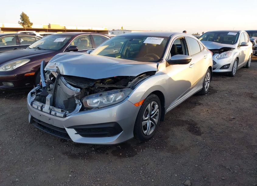 Photo 2 of 2018 Honda Civic LX (VIN 19XFC2F54JE030000)