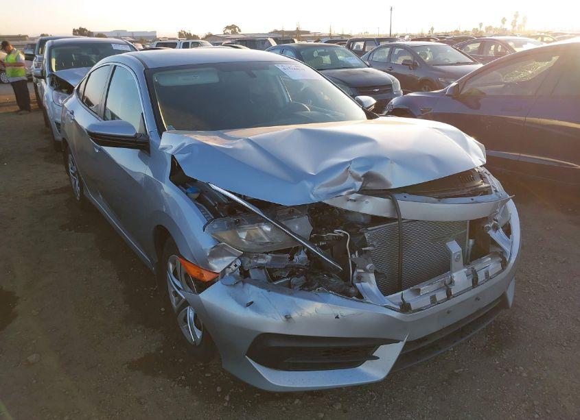 Photo 6 of 2018 Honda Civic LX (VIN 19XFC2F54JE030000)