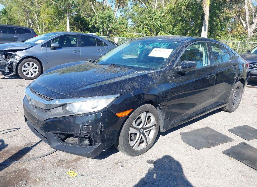 Photo 2 of 2018 Honda Civic LX (VIN 19XFC2F54JE032748)