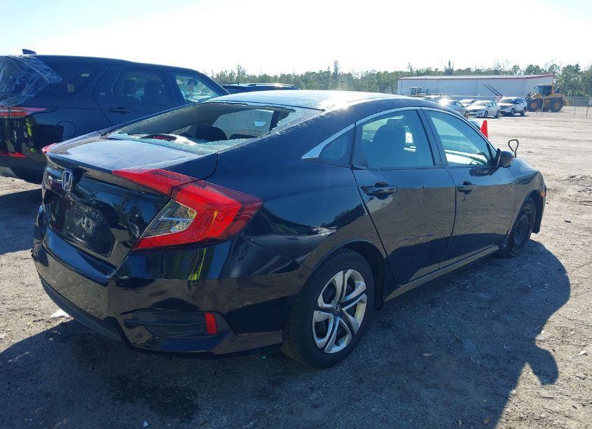 Photo 4 of 2018 Honda Civic LX (VIN 19XFC2F54JE032748)