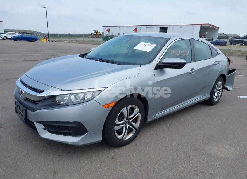 Photo 2 of 2018 Honda Civic LX (VIN 19XFC2F54JE039604)