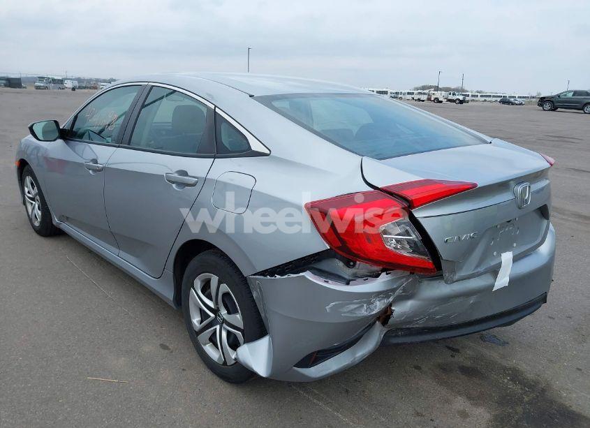 Photo 3 of 2018 Honda Civic LX (VIN 19XFC2F54JE039604)