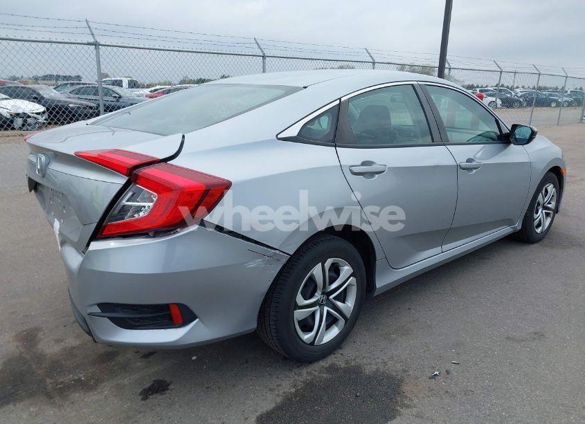 Photo 4 of 2018 Honda Civic LX (VIN 19XFC2F54JE039604)