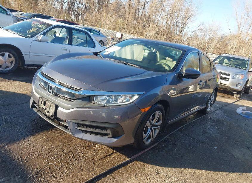 Photo 2 of 2018 Honda Civic LX (VIN 19XFC2F54JE041921)