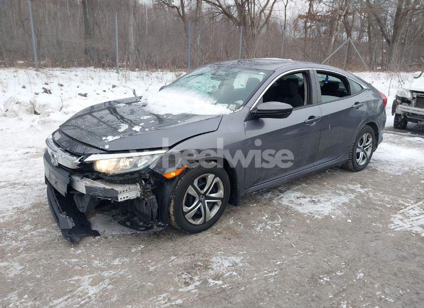 Photo 2 of 2018 Honda Civic LX (VIN 19XFC2F54JE203188)