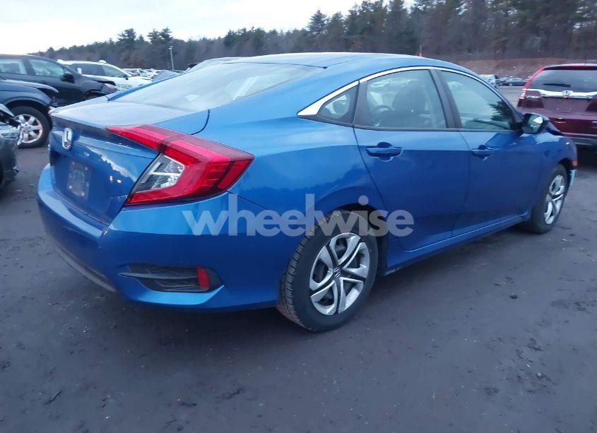 Photo 4 of 2018 Honda Civic LX (VIN 19XFC2F54JE209475)