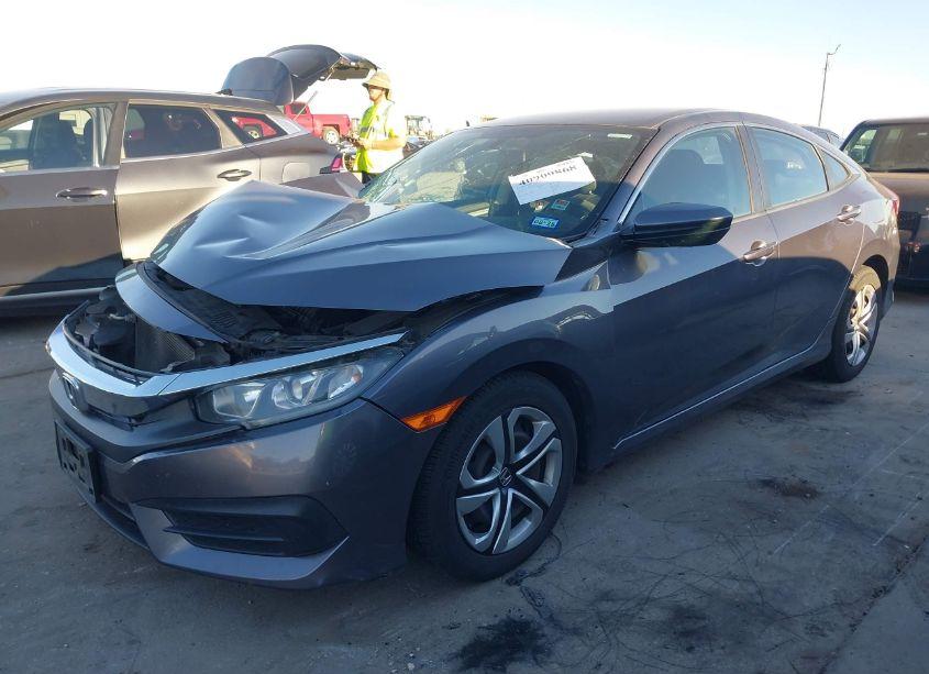 Photo 2 of 2017 Honda Civic LX (VIN 19XFC2F55HE001700)