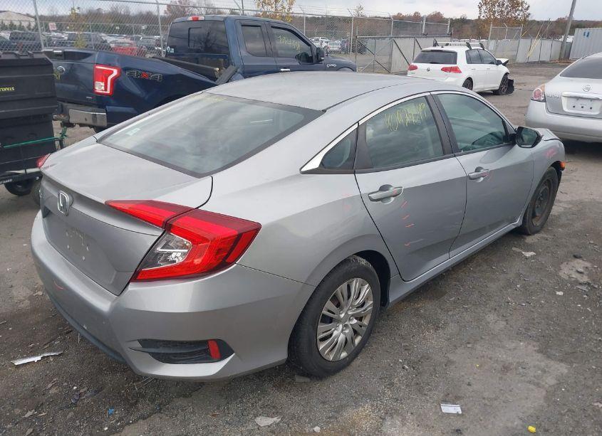 Photo 4 of 2017 Honda Civic LX (VIN 19XFC2F55HE031103)