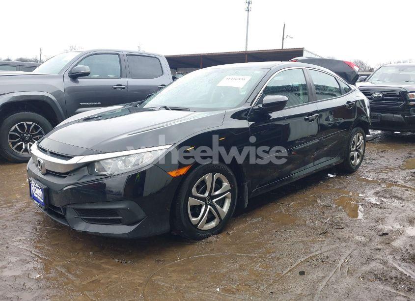 Photo 2 of 2017 Honda Civic LX (VIN 19XFC2F55HE032669)