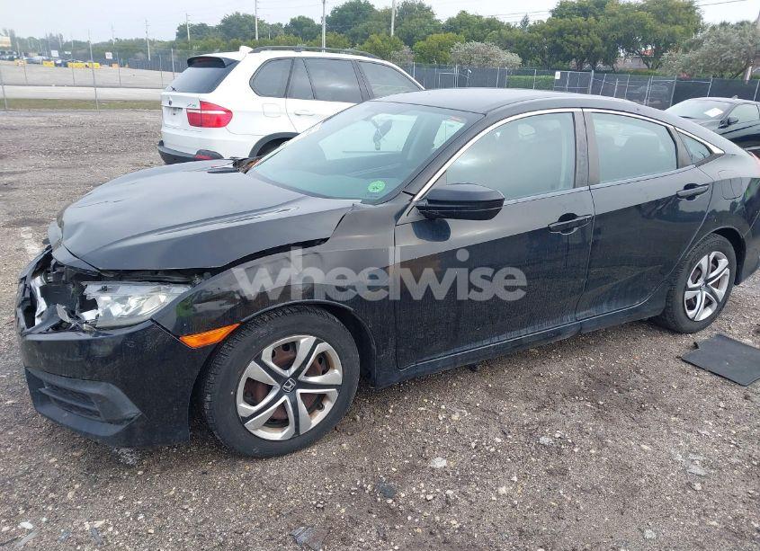 Photo 2 of 2017 Honda Civic LX (VIN 19XFC2F55HE039783)