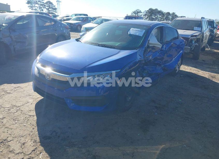 Photo 2 of 2017 Honda Civic LX (VIN 19XFC2F55HE053909)