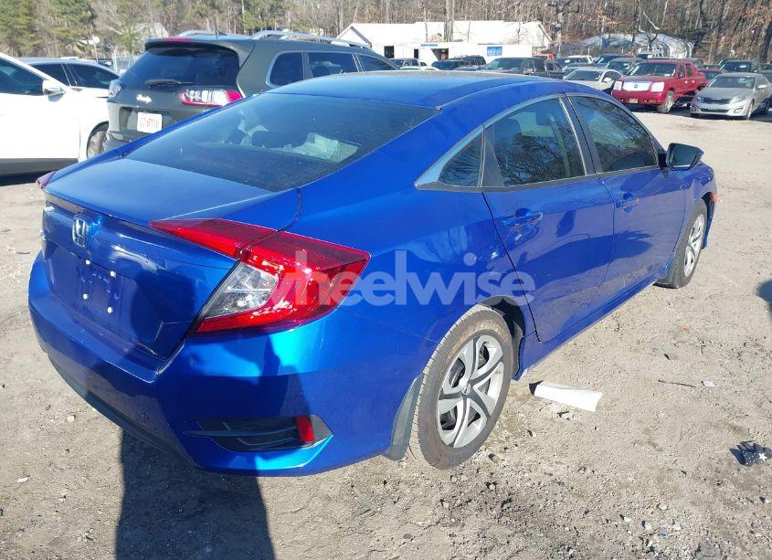 Photo 4 of 2017 Honda Civic LX (VIN 19XFC2F55HE053909)