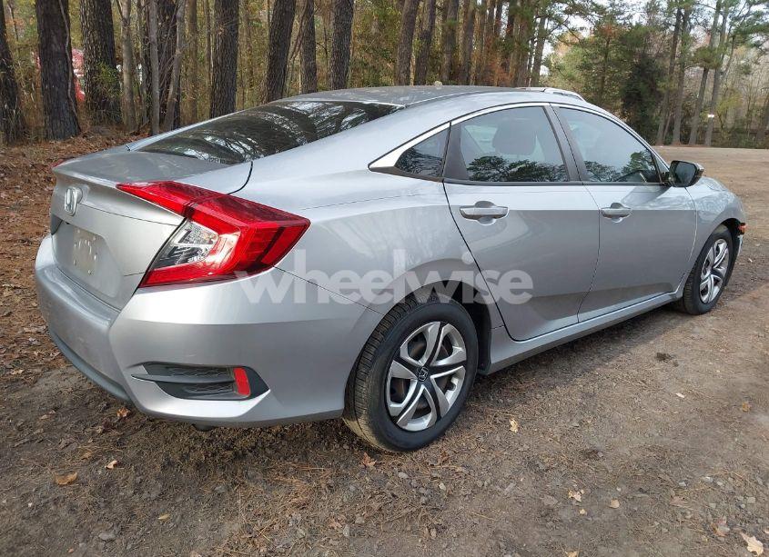 Photo 4 of 2017 Honda Civic LX (VIN 19XFC2F55HE059077)