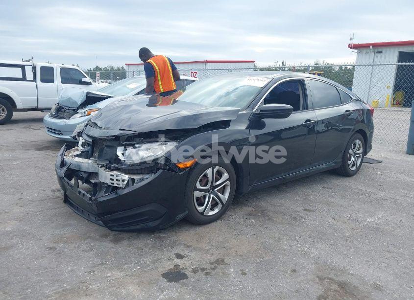 Photo 2 of 2017 Honda Civic LX (VIN 19XFC2F55HE061962)