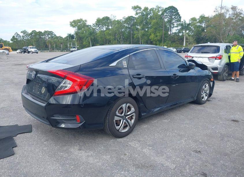 Photo 4 of 2017 Honda Civic LX (VIN 19XFC2F55HE061962)