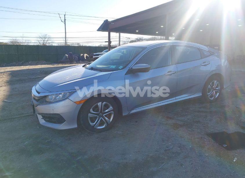 Photo 2 of 2017 Honda Civic LX (VIN 19XFC2F55HE203467)