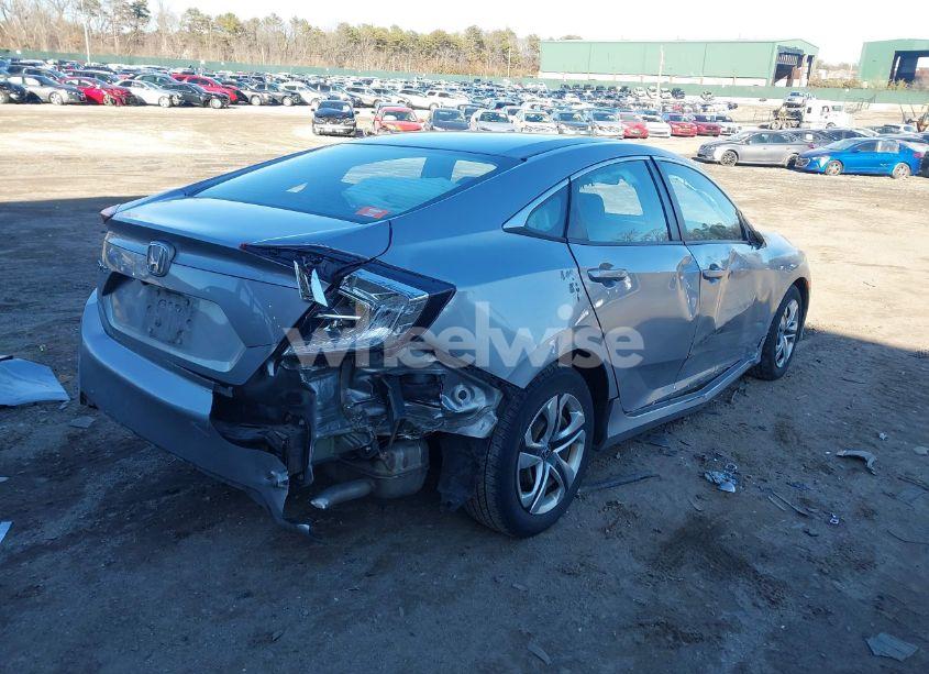 Photo 4 of 2017 Honda Civic LX (VIN 19XFC2F55HE203467)