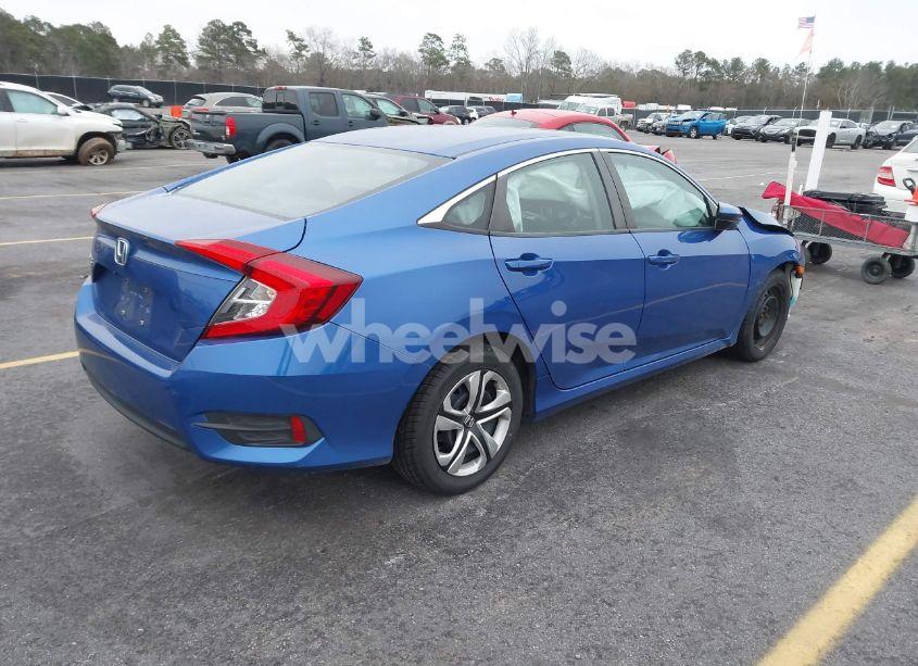 Photo 4 of 2017 Honda Civic LX (VIN 19XFC2F55HE223203)