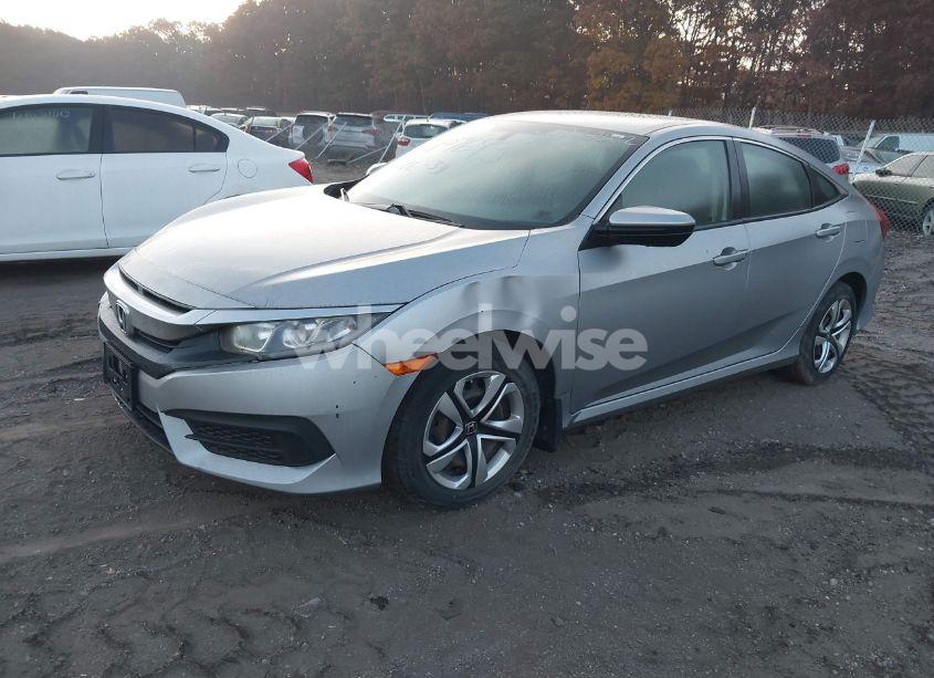 Photo 2 of 2017 Honda Civic LX (VIN 19XFC2F55HE232094)