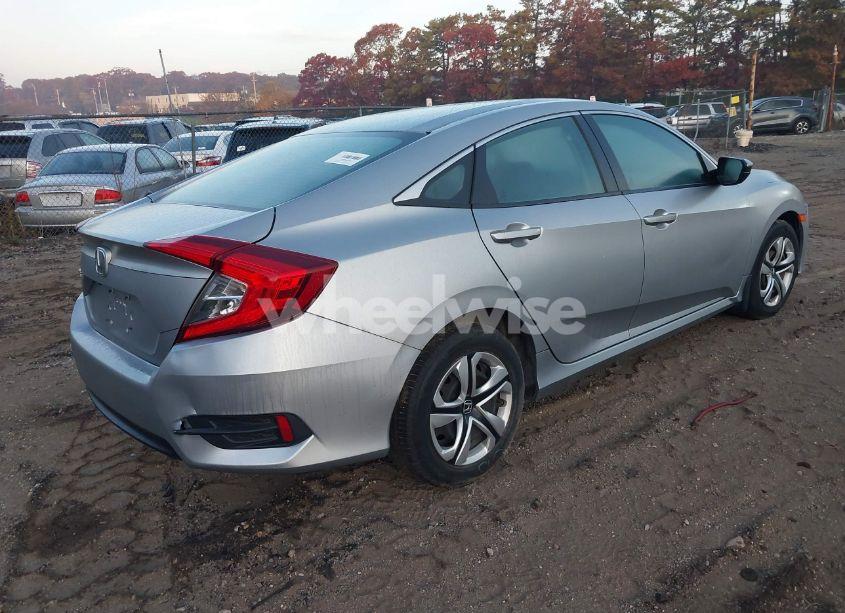 Photo 4 of 2017 Honda Civic LX (VIN 19XFC2F55HE232094)
