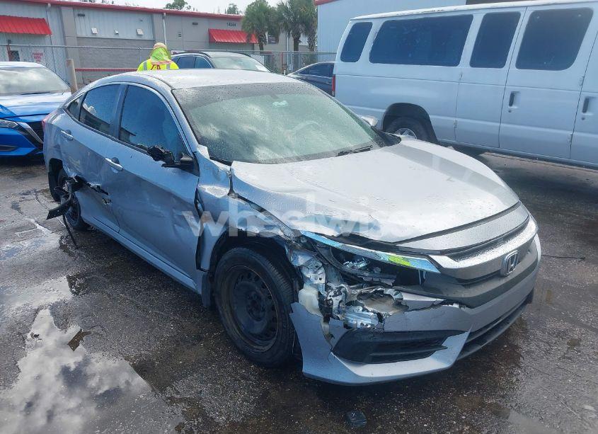 2018 Honda Civic LX (VIN 19XFC2F55JE003713) main photo