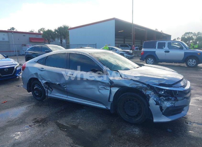 Photo 17 of 2018 Honda Civic LX (VIN 19XFC2F55JE003713)