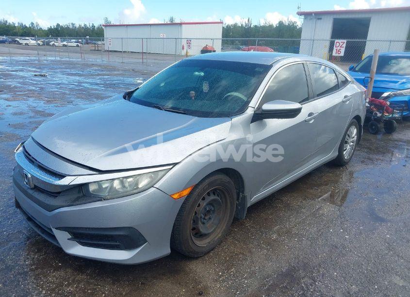 Photo 2 of 2018 Honda Civic LX (VIN 19XFC2F55JE003713)