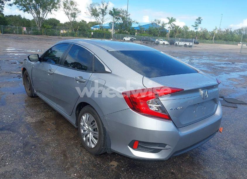 Photo 3 of 2018 Honda Civic LX (VIN 19XFC2F55JE003713)