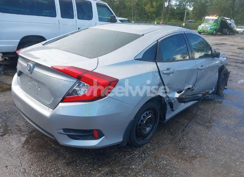 Photo 4 of 2018 Honda Civic LX (VIN 19XFC2F55JE003713)