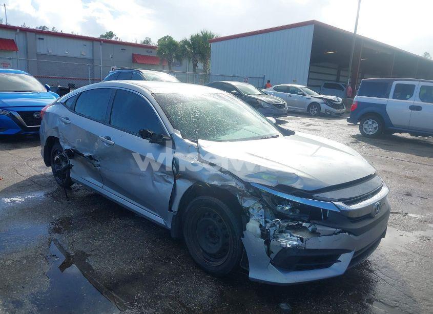 Photo 6 of 2018 Honda Civic LX (VIN 19XFC2F55JE003713)